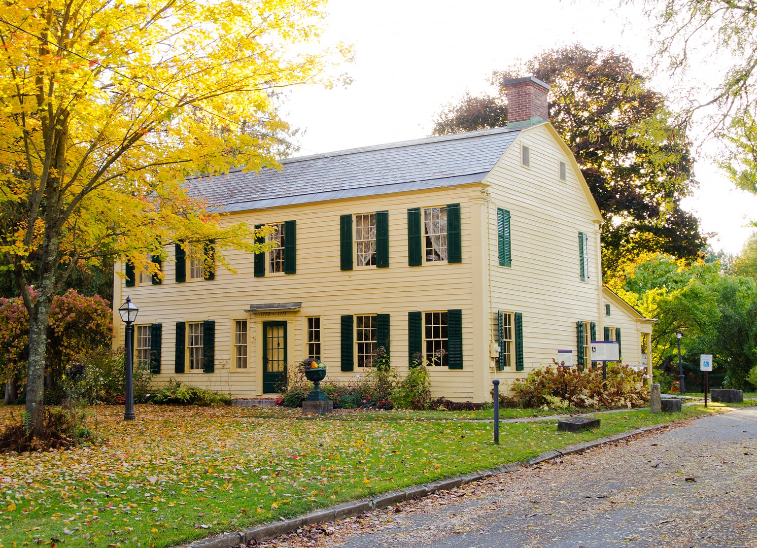 Exterior of the Old Fort House Museum in Fort Edward, New York, a gambrel-roofed wood-frame structure built in 1772