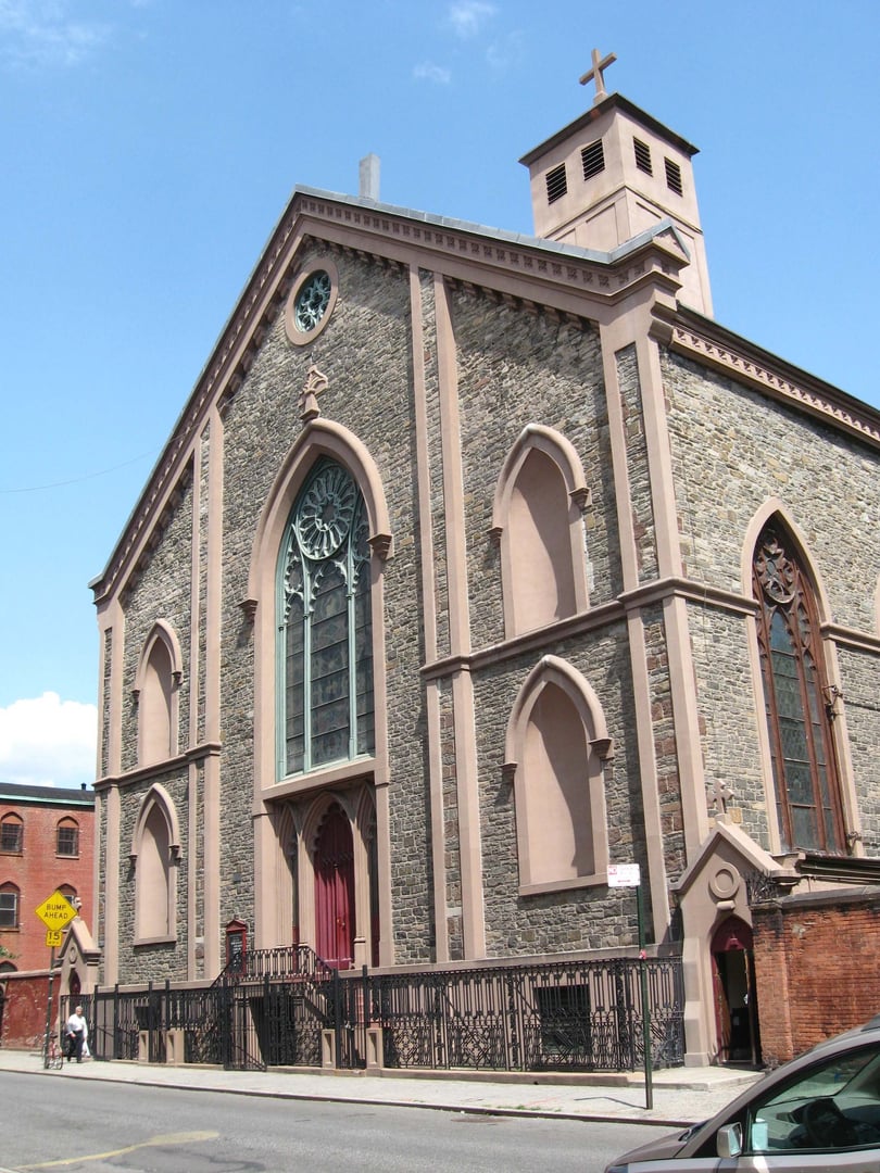 Mulberry Street facade of the Basilica of St. Patrick's Old Cathedral in Nolita, Manhattan, photographed on a sunny day.