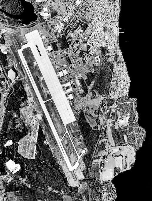 USGS aerial view of the former Plattsburgh Air Force Base in Plattsburgh, New York, taken May 4, 1994, showing the Cold War-era base layout near Lake Champlain