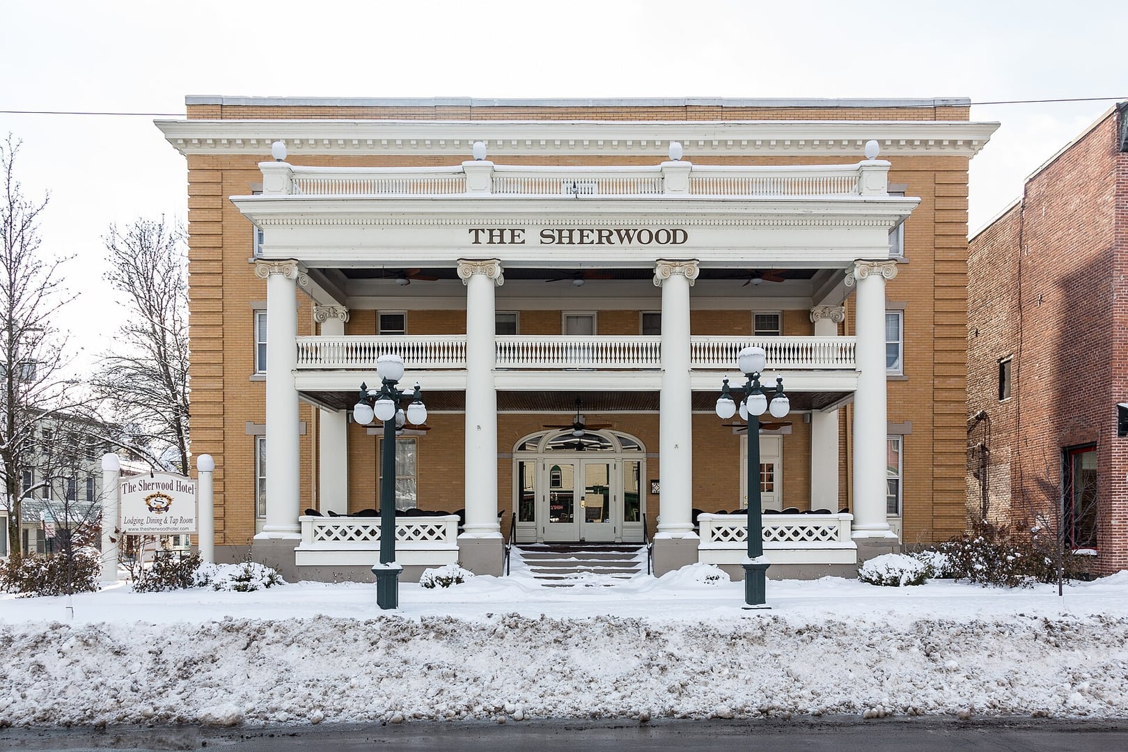Exterior of the 1913 Sherwood Hotel at 25 Genesee Street in downtown Greene, New York, a historic stagecoach inn
