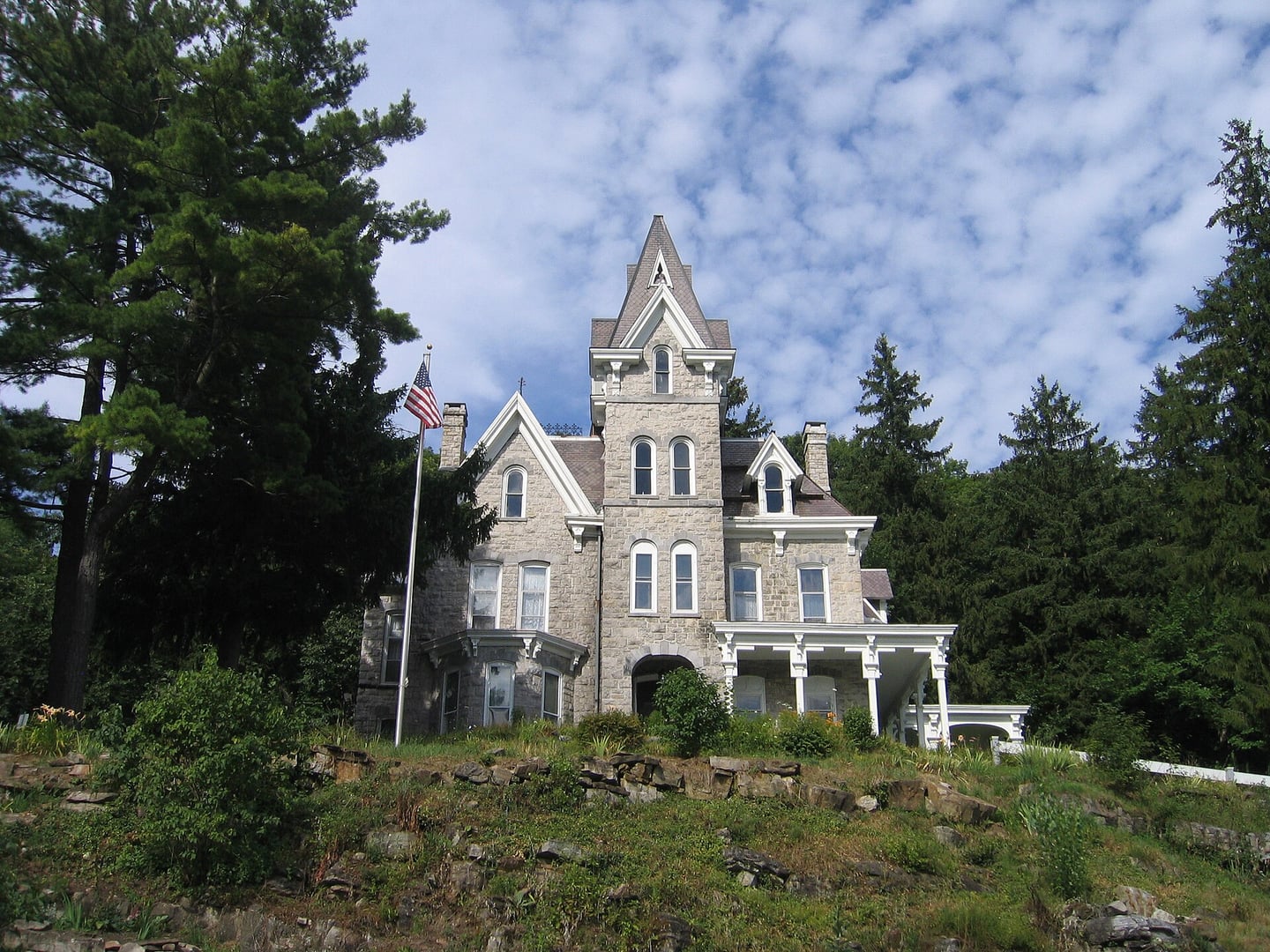 Grey-sandstone Victorian Gothic facade of Skene Manor on Skene Mountain above Whitehall, New York, built 1872-1874