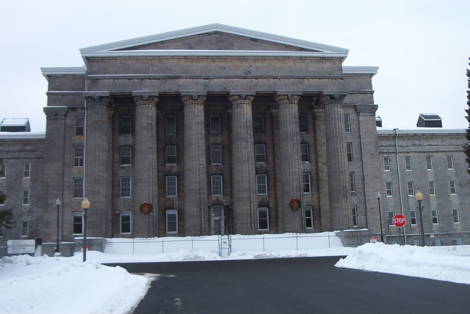 Front facade of the Utica State Hospital Old Main building in December 2007, showing Greek Revival architecture