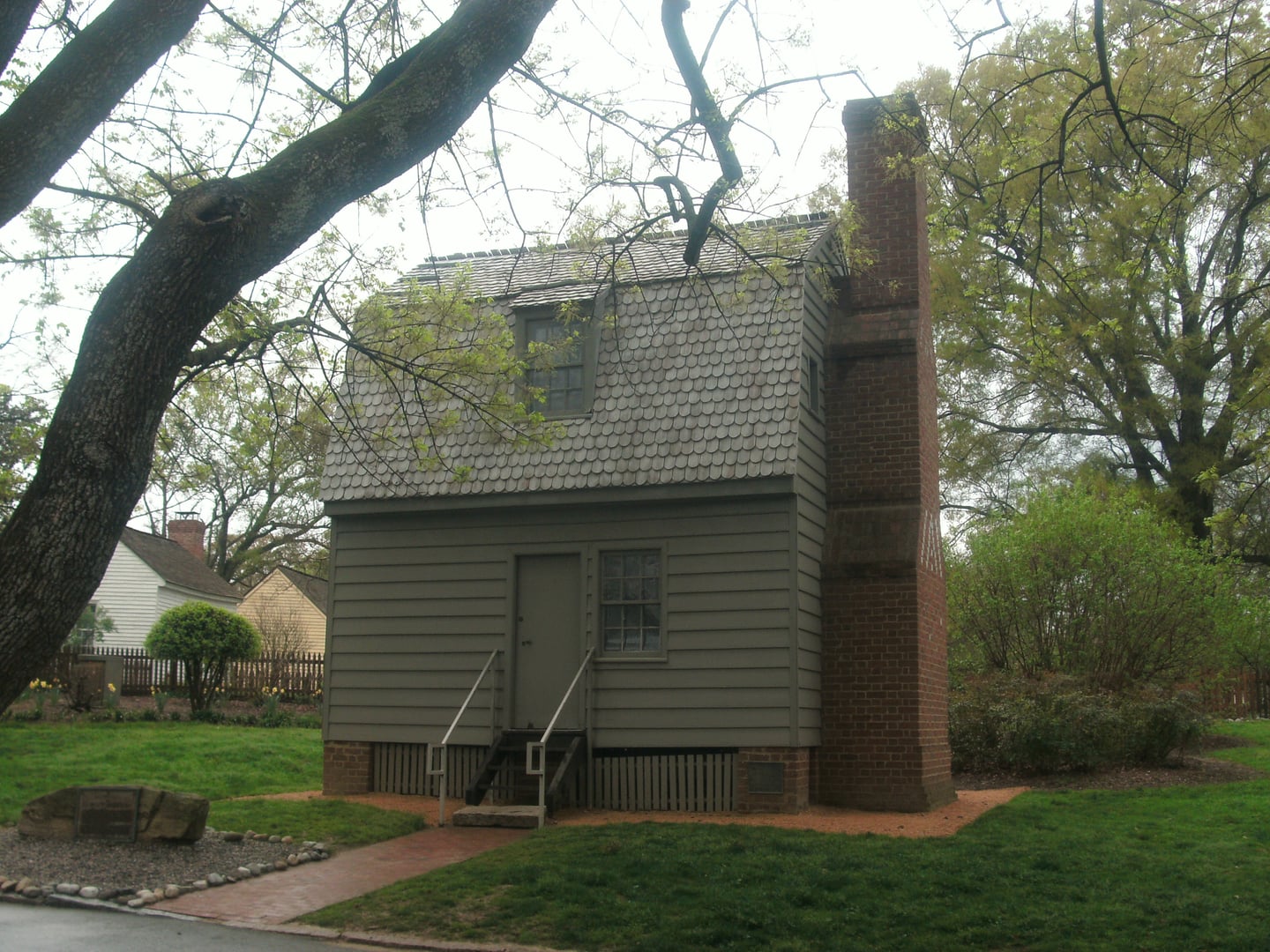 The gambrel-roof Andrew Johnson Birthplace cabin at Mordecai Historic Park in Raleigh, North Carolina, photographed in 2015.