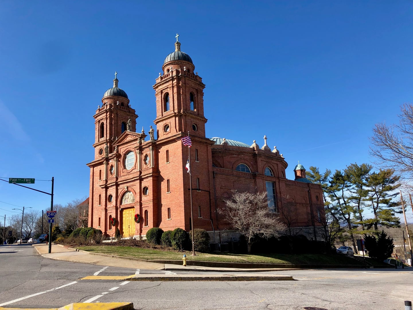 Spanish Renaissance Revival facade and tile dome of the Basilica of St. Lawrence on Haywood Street in downtown Asheville, North Carolina, a minor basilica completed in 1909.