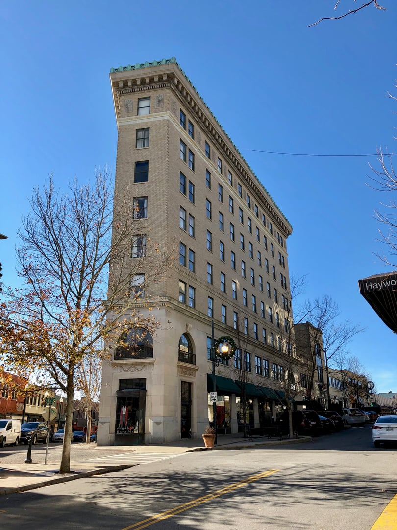 Vertical view of the nine-story 1926 Flat Iron Building at Battery Park Avenue and Wall Street in downtown Asheville, North Carolina.
