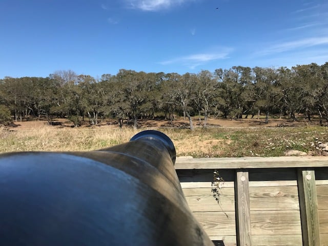 Cannon and earthwork land face of Fort Fisher near Kure Beach, North Carolina