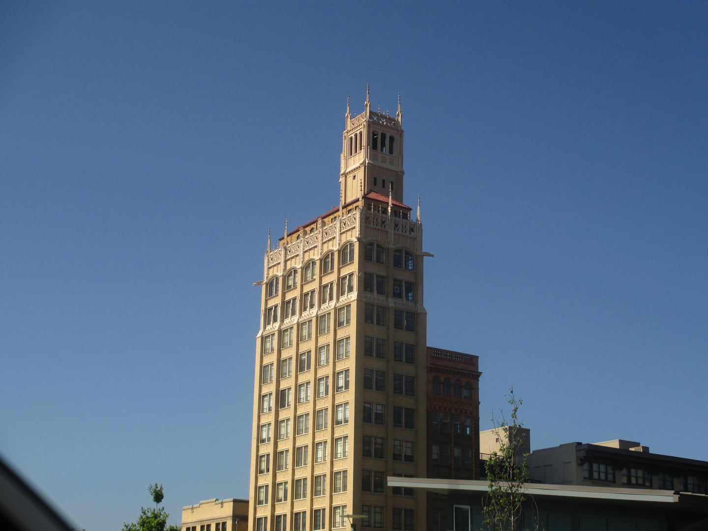 Neo-Gothic terra-cotta facade of the 1924 Jackson Building, the first skyscraper in western North Carolina, rising over Pack Square in downtown Asheville.