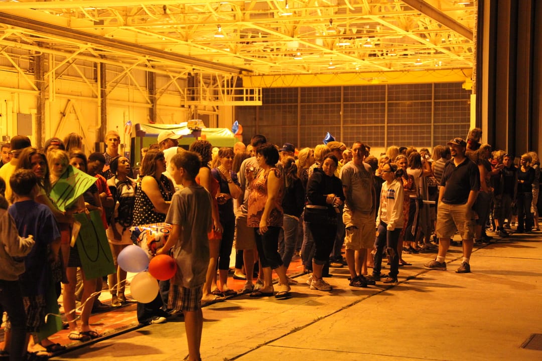 Families and friends wait for Marine Attack Squadron 223 Marines to arrive returning from Afghanistan, at the squadron's hangar May 6, aboard Marine Corps Air Station Cherry Point, N.C. The squadron was deployed to southern Afghanistan to provide close air support and reconnaissance for the ground u