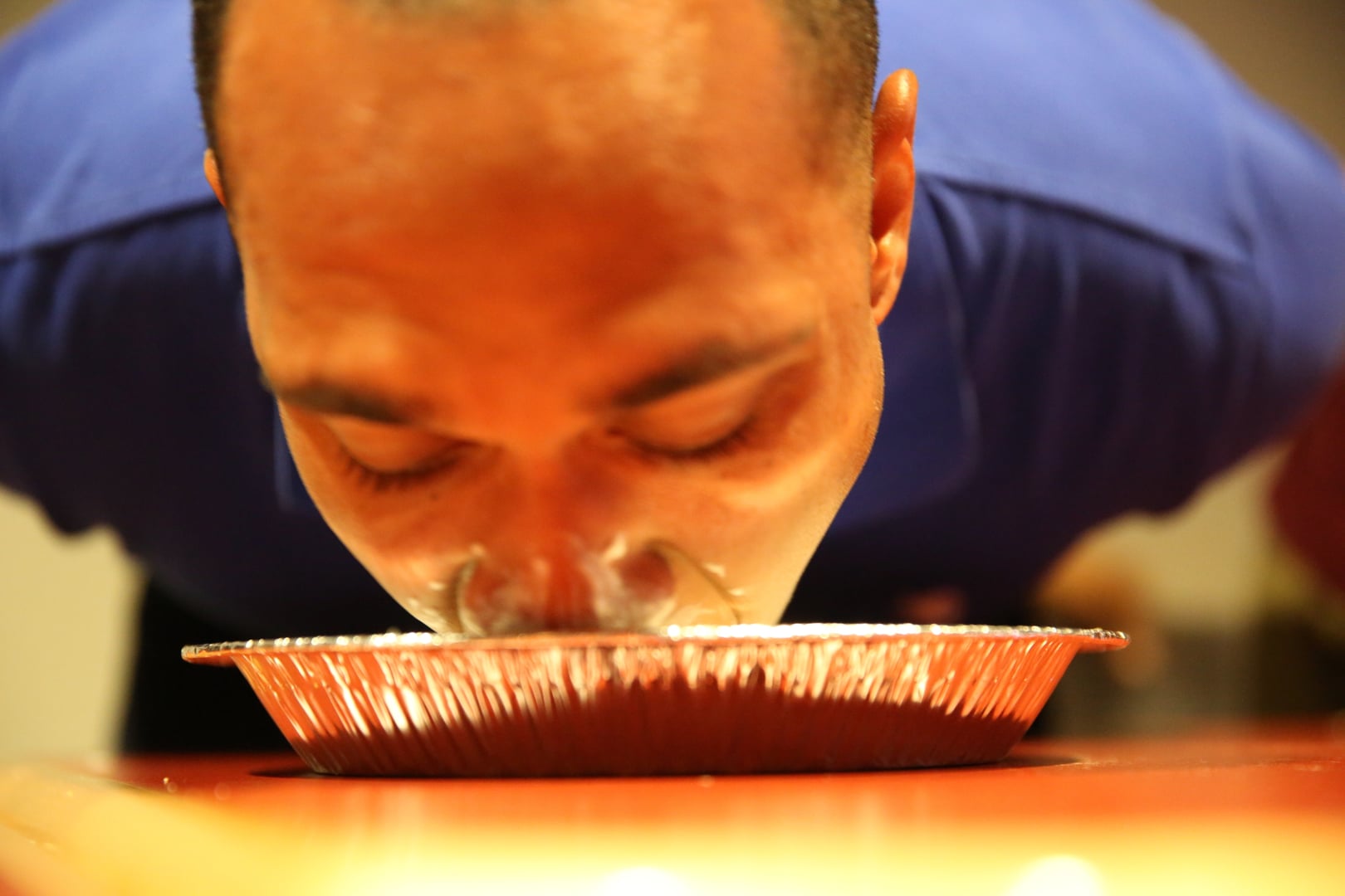 Pfc. Jodson B. Graves, a combat photographer with Marine Wing Headquarters Squadron 2, participates in a pie eating contest during the Big Chill event at the Roadhouse Dec. 17.
Unit: II Marine Expeditionary Force