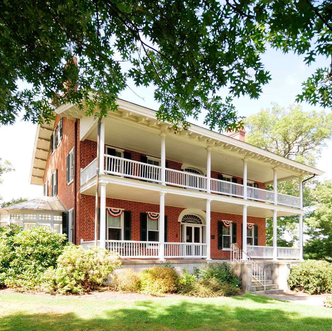 Brick Greek Revival facade of the c.1840 Smith-McDowell House on Victoria Road in Asheville, North Carolina, the oldest brick home in Buncombe County.