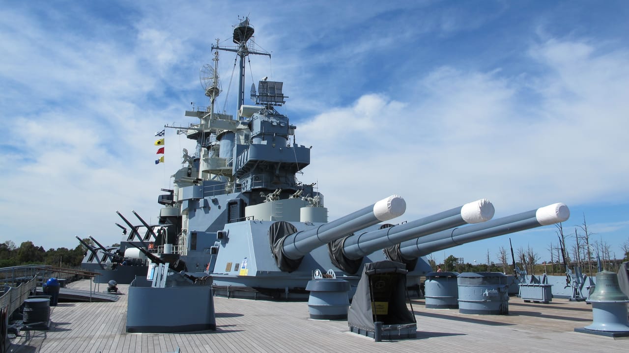 The USS North Carolina memorial ship broadside, forward 16-inch gun turrets and superstructure, Wilmington, North Carolina.