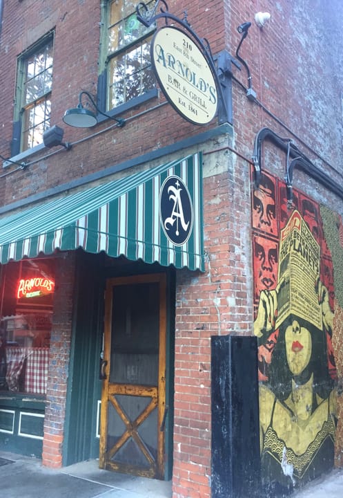 The 1830s Italianate exterior of Arnold's Bar and Grill at 210 E 8th Street, Cincinnati