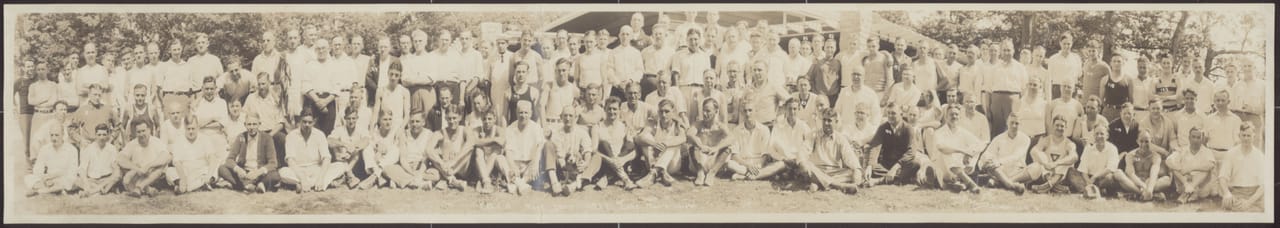 A photograph of young men attending the YMCA Men's Camp in 1927 at Lake Mac-O-Chee in Bellefontaine, Ohio. The lake was previously known as Silver Lake and is located at Camp Willson. The camp began in 1918 and was later named Camp Willson after Columbus carriage maker Alfred L. Willson donated $20,