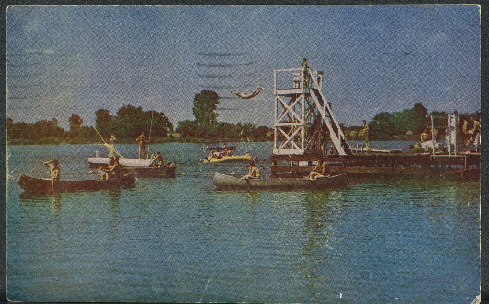A photograph of young men attending the YMCA Men's Camp in 1927 at Lake Mac-O-Chee in Bellefontaine, Ohio. The lake was previously known as Silver Lake and is located at Camp Willson. The camp began in 1918 and was later named Camp Willson after Columbus carriage maker Alfred L. Willson donated $20,
