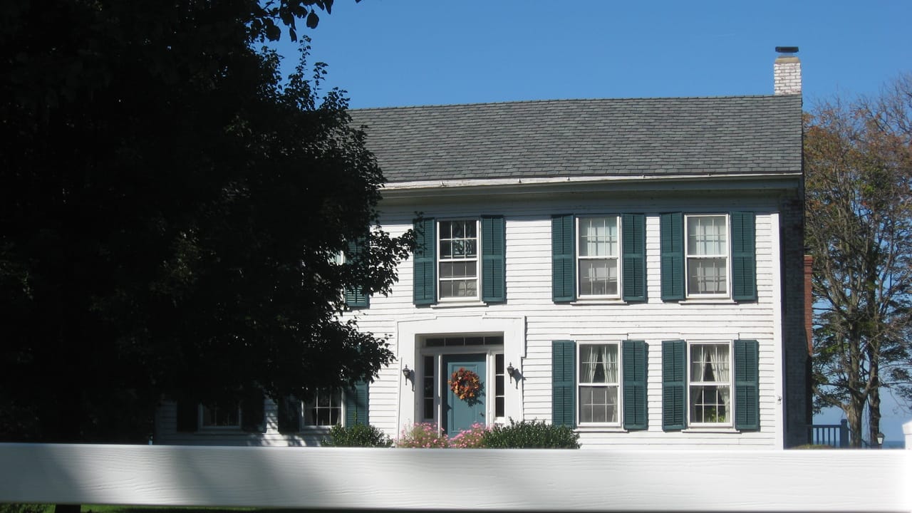 Front of the William H. Root House, located at 3535 E. Erie Avenue (U.S. Route 6) in Lorain, Ohio, United States.  Built in 1845, it is listed on the National Register of Historic Places.