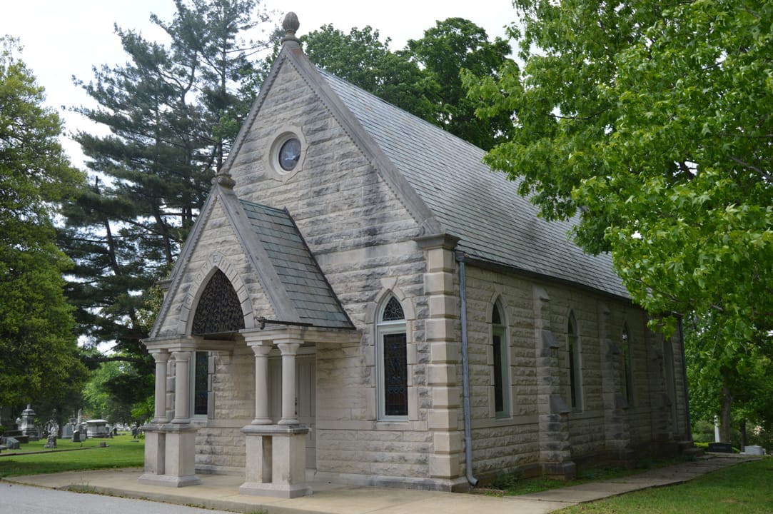 Front and eastern side of the Grove Hill Cemetery Chapel, located in Grove Hill Cemetery southeast of Shelbyville in Shelby County, Kentucky, United States.  Built in 1893, it is listed on the National Register of Historic Places.