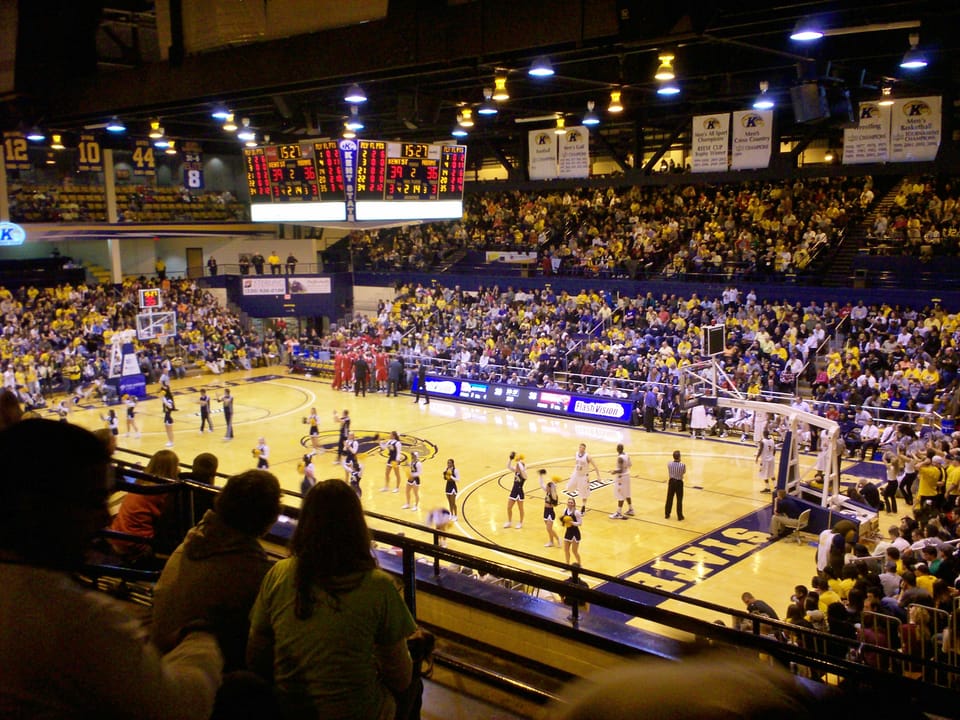 Interior view of the Memorial Athletic and Convocation Center at Kent State University in Kent, Ohio during a men's basketball game between Kent State and Miami University.  The Blue and Gold Loge can be seen on the upper left of the picture.