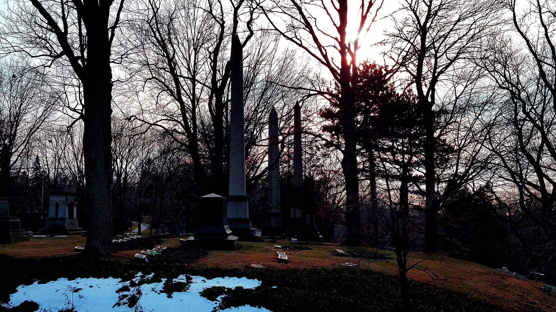Sunset view across Lake View Cemetery in Cleveland, Ohio, the 1869 Garden Cemetery and resting place of President James A. Garfield.