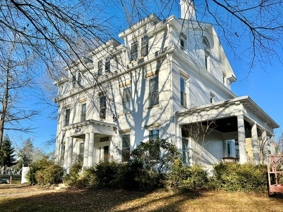 Built in 1855, this Greek Revival and Classical Revival-style house was built for W. P. Skinner, and was later the home of George White, whom was the governor of Ohio from 1931 until 1934.  The house is clad in painted brick with a side-gable roof, one-over-one windows, a two-story rear ell, a stone