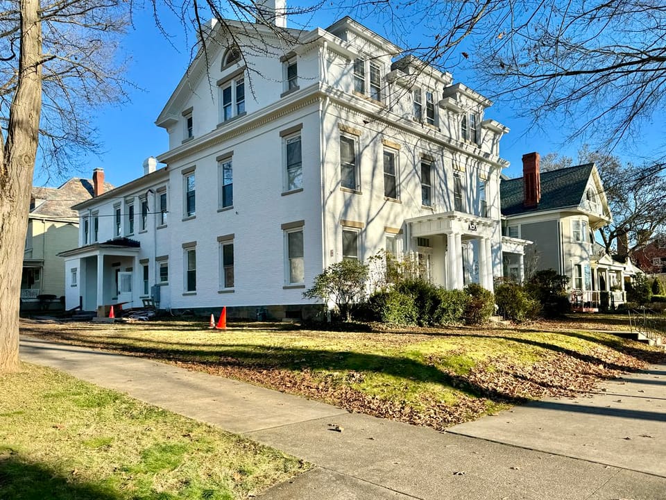 Built in 1855, this Greek Revival and Classical Revival-style house was built for W. P. Skinner, and was later the home of George White, whom was the governor of Ohio from 1931 until 1934.  The house is clad in painted brick with a side-gable roof, one-over-one windows, a two-story rear ell, a stone