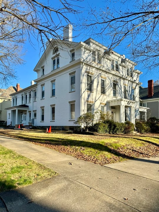 Built in 1855, this Greek Revival and Classical Revival-style house was built for W. P. Skinner, and was later the home of George White, whom was the governor of Ohio from 1931 until 1934.  The house is clad in painted brick with a side-gable roof, one-over-one windows, a two-story rear ell, a stone