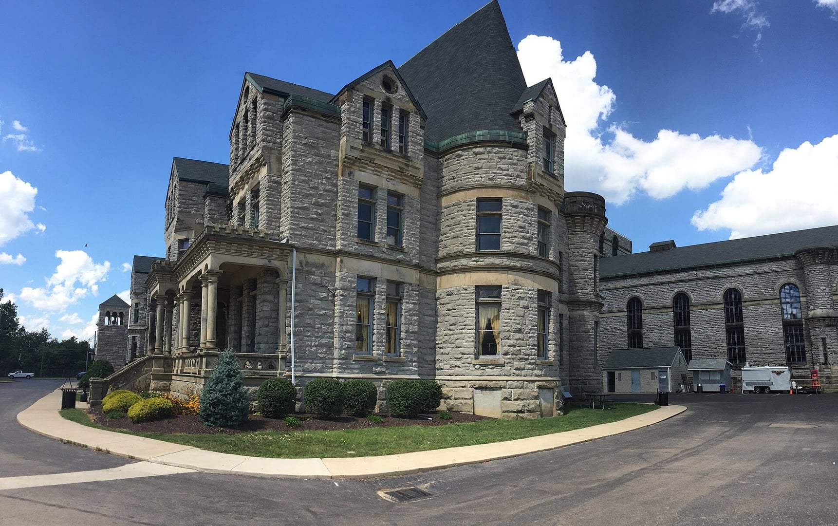 Victorian Gothic limestone exterior of the Ohio State Reformatory at 100 Reformatory Road in Mansfield, Ohio, showing the castle-like turrets and arched windows