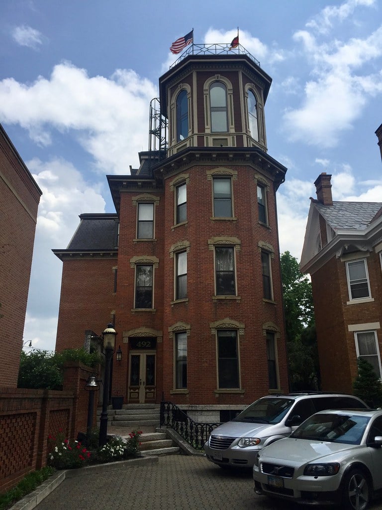 Schwartz Castle's turret rising above South Third Street in German Village, Columbus