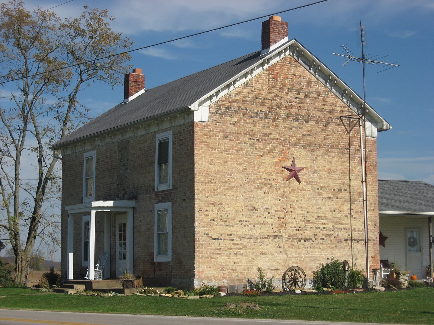 Front and southern side of the 1801 Wickerham Inn, the oldest brick building in Adams County, located along Ohio State Route 41 north of Peebles in Franklin Township