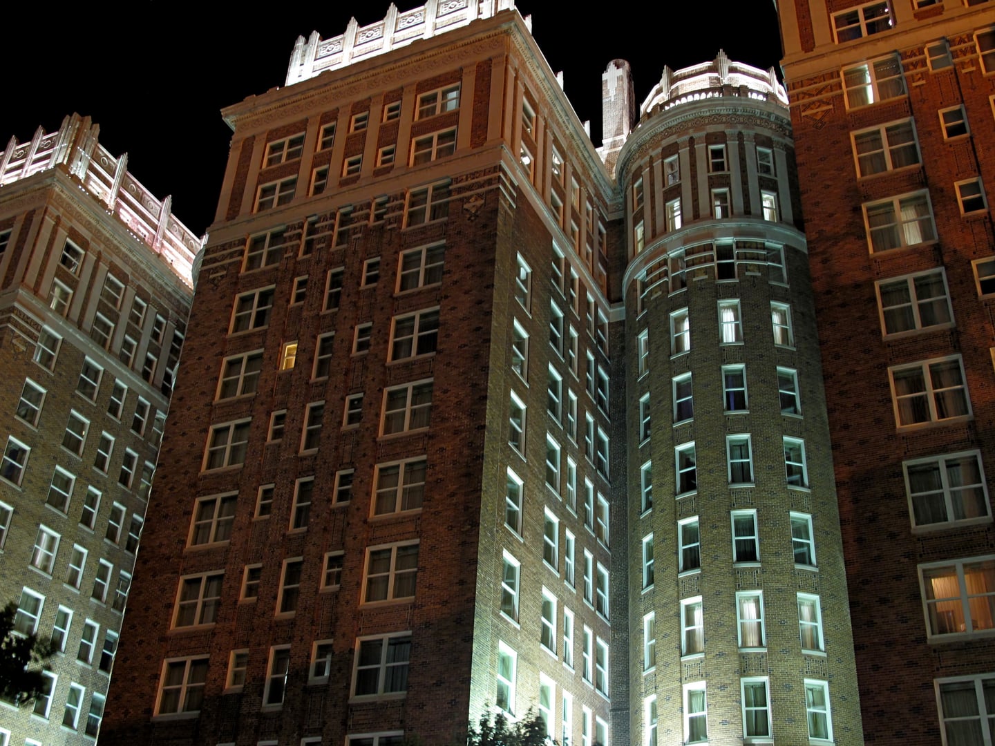 Skirvin Hilton Hotel illuminated at night in downtown Oklahoma City, 1911 historic high-rise