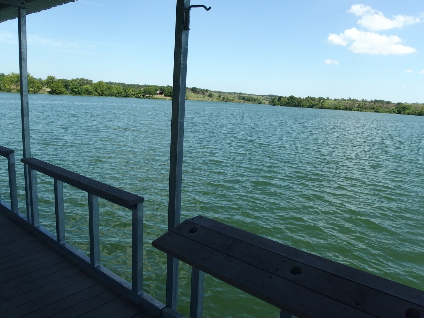 Fishing dock and eastern shoreline of Veterans Lake in Chickasaw National Recreation Area, Sulphur, Oklahoma