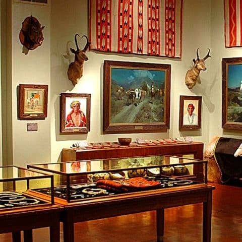 Woolaroc Museum main building with bison on the 3700-acre preserve in Bartlesville Oklahoma