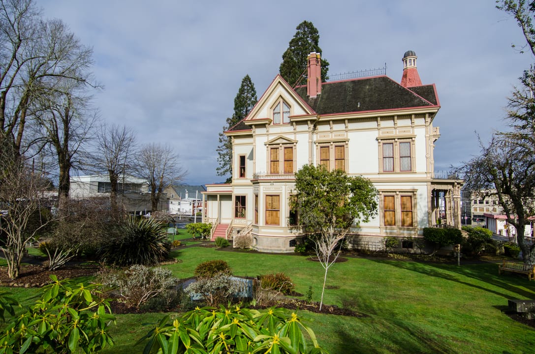The Flavel House seen from its back lawn and garden