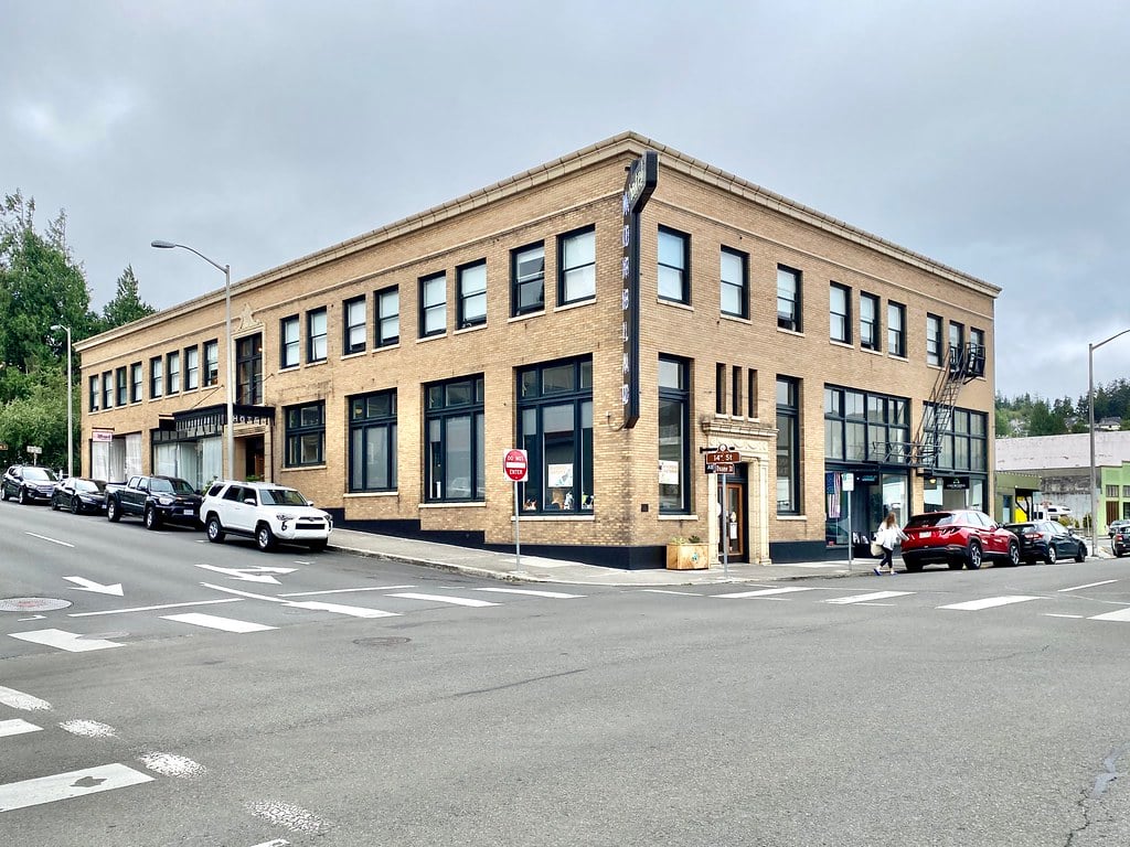 Restored brick facade of the Norblad Hotel on 14th Street in downtown Astoria, Oregon