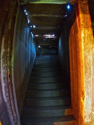 Brick-walled subterranean passage on the Astoria Underground Tour beneath downtown Astoria, Oregon
