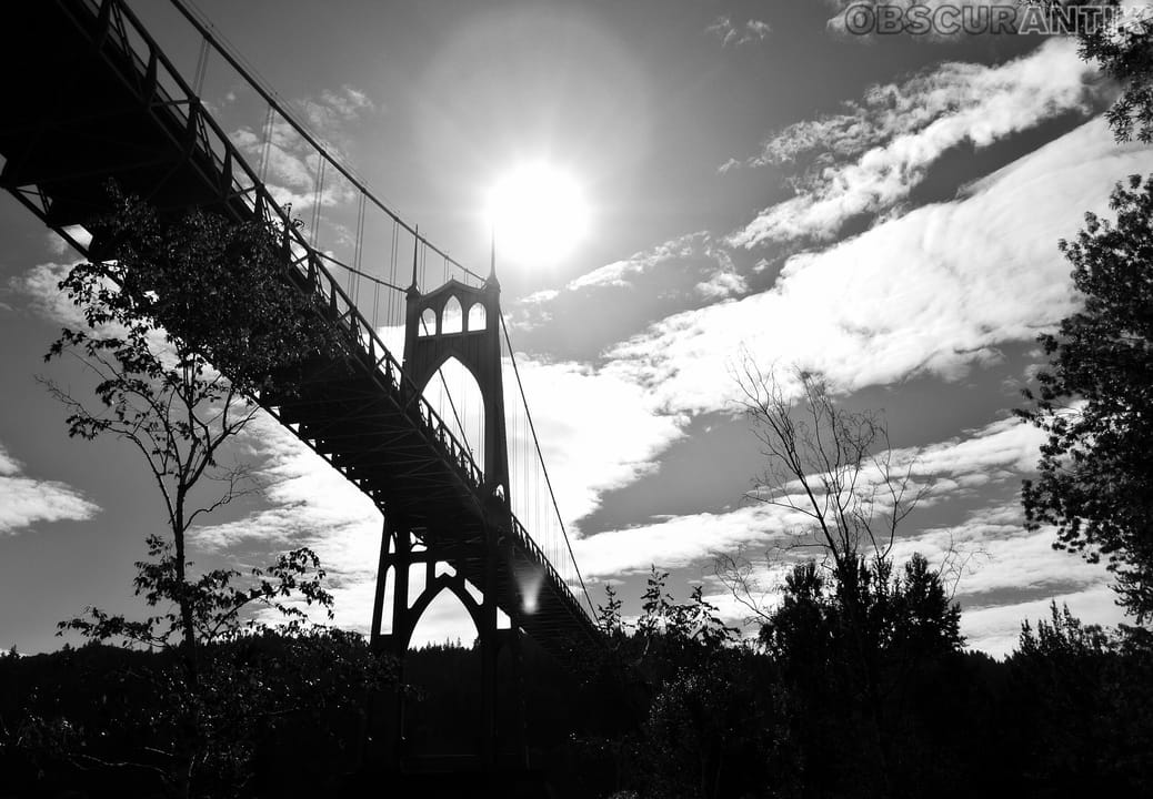 500px provided description: Shot with a Nikon 1 J2, edited with Snapseed. Part of the My Favorite Bridge Ever series. [#trees ,#sky ,#beauty ,#travel ,#sun ,#sunlight ,#clouds ,#bridge ,#summer ,#beautiful ,#Nikon ,#Oregon ,#Portland ,#PDX ,#Cathedral Park ,#St. Johns Bridge ,#Nikon 1 J2 ,#North Por