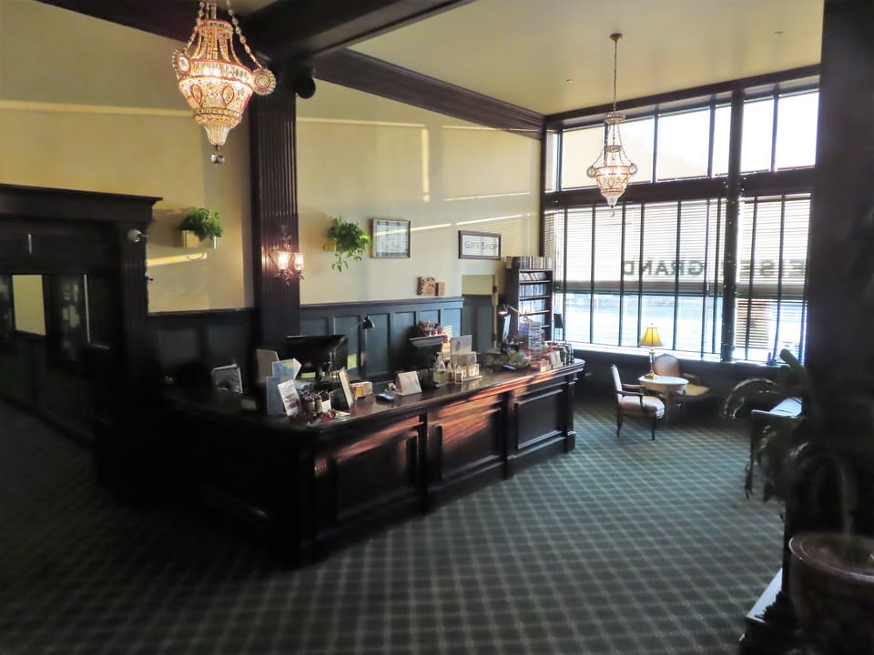 The Geiser Grand Hotel's wood-paneled lobby and front desk, Baker City, Oregon, 2021.