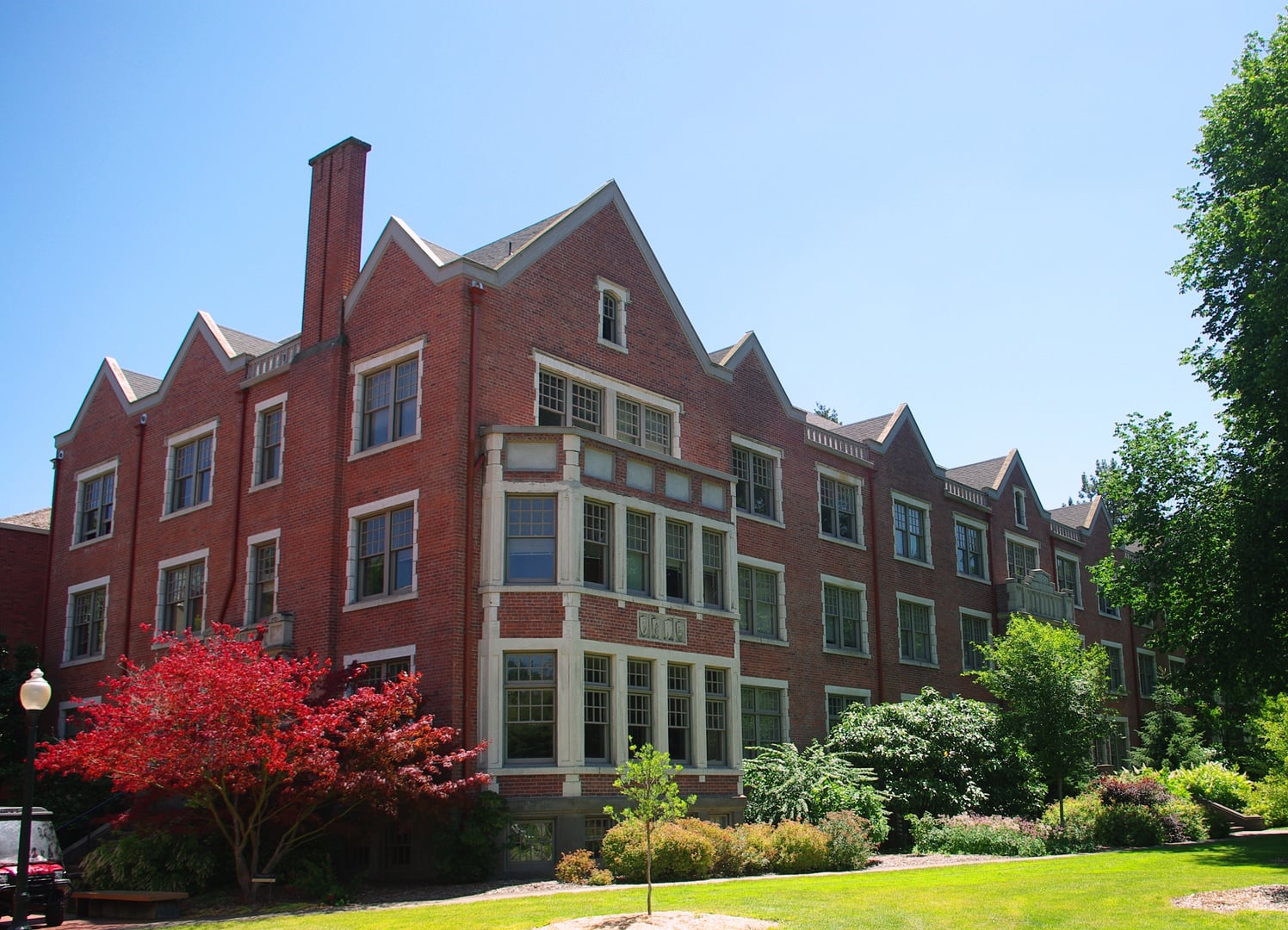 Lausanne Hall, the 1920 brick dormitory on the Willamette University campus in Salem, Oregon, viewed from the front and north side