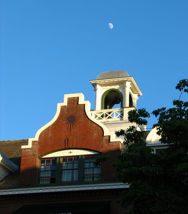 The bell cupola and Dutch-gabled roofline of the main building at McMenamins Edgefield, the former Multnomah County Poor Farm.