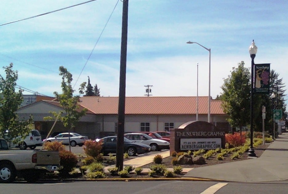 Sign for the Newberg Graphic newspaper office in Newberg, Oregon