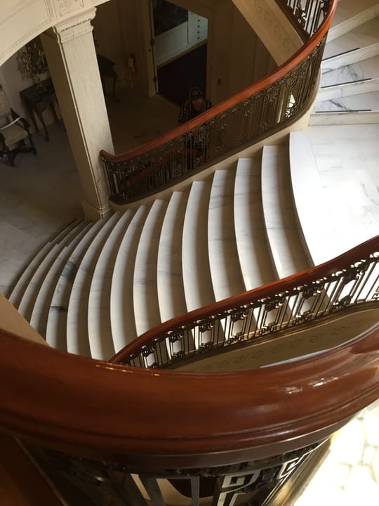 The Pittock Mansion's marble spiral staircase, viewed down through its central oval well, Portland, Oregon.