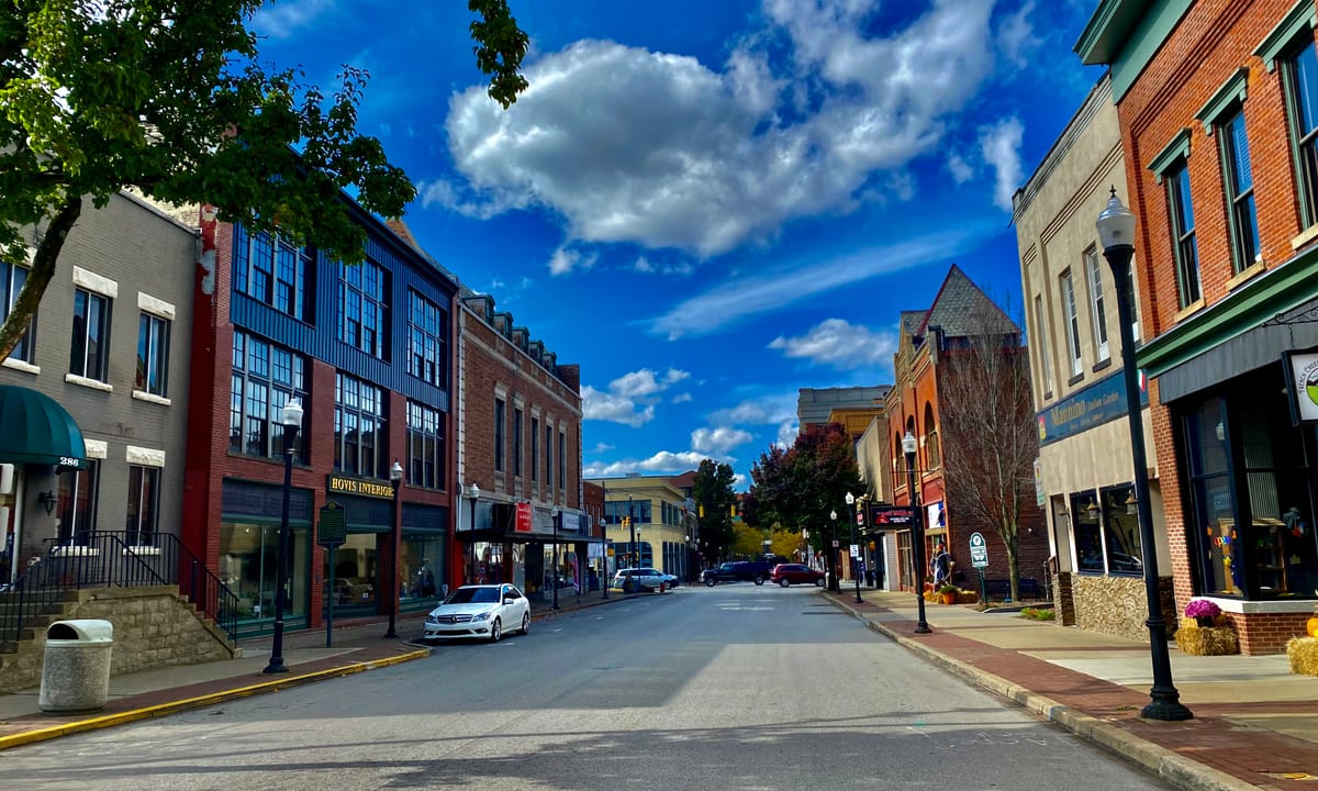 Looking westward along Chestnut Street from just past the corner of Cottage Street in downtown Meadville, Pennsylvania on an October 2022 afternoon.