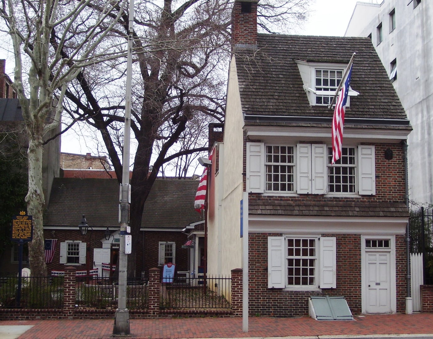 Two-and-a-half-story brick colonial row house at 239 Arch Street in Philadelphia's Old City