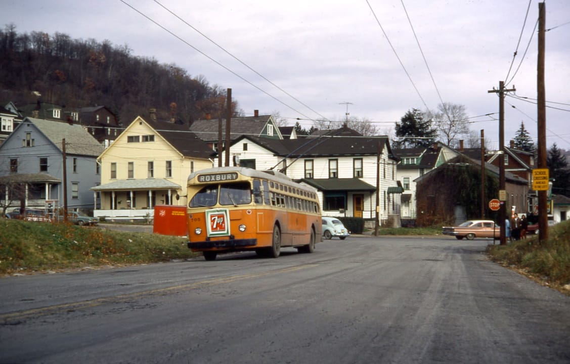 Johnstown trolley coach (or trackless trolley) No. 705, built in 1951 by the St. Louis Car Company, is southbound on Roxbury Avenue just south of Southmont Blvd., outbound on the Roxbury line. The photo was taken on the final day of service for the Johnstown trolley coach system.