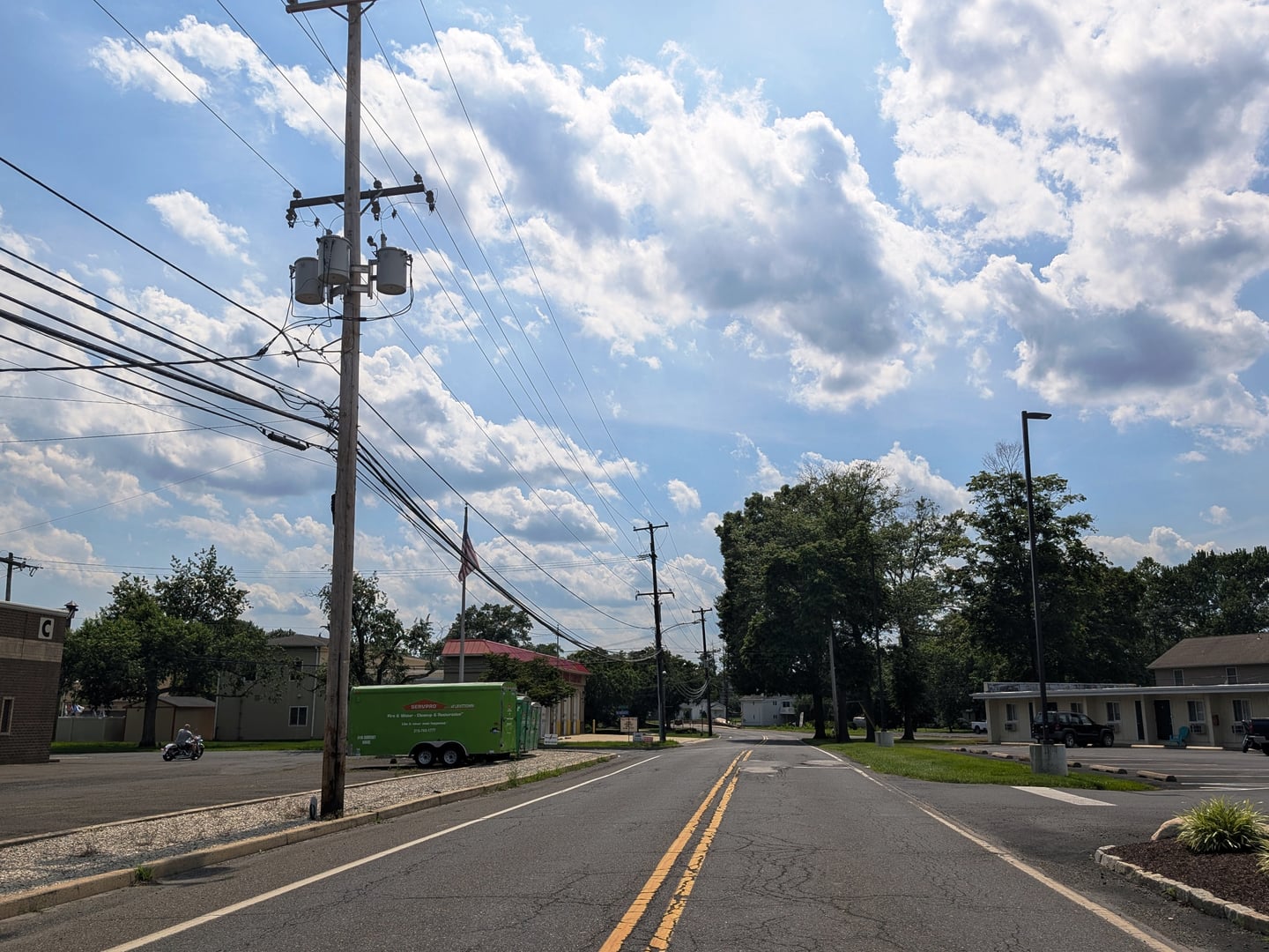 Photo of northbound Old Bristol Pike in Tullytown, Pennsylvania. Photo taken looking north-northeast past the split from U.S. Route 13.