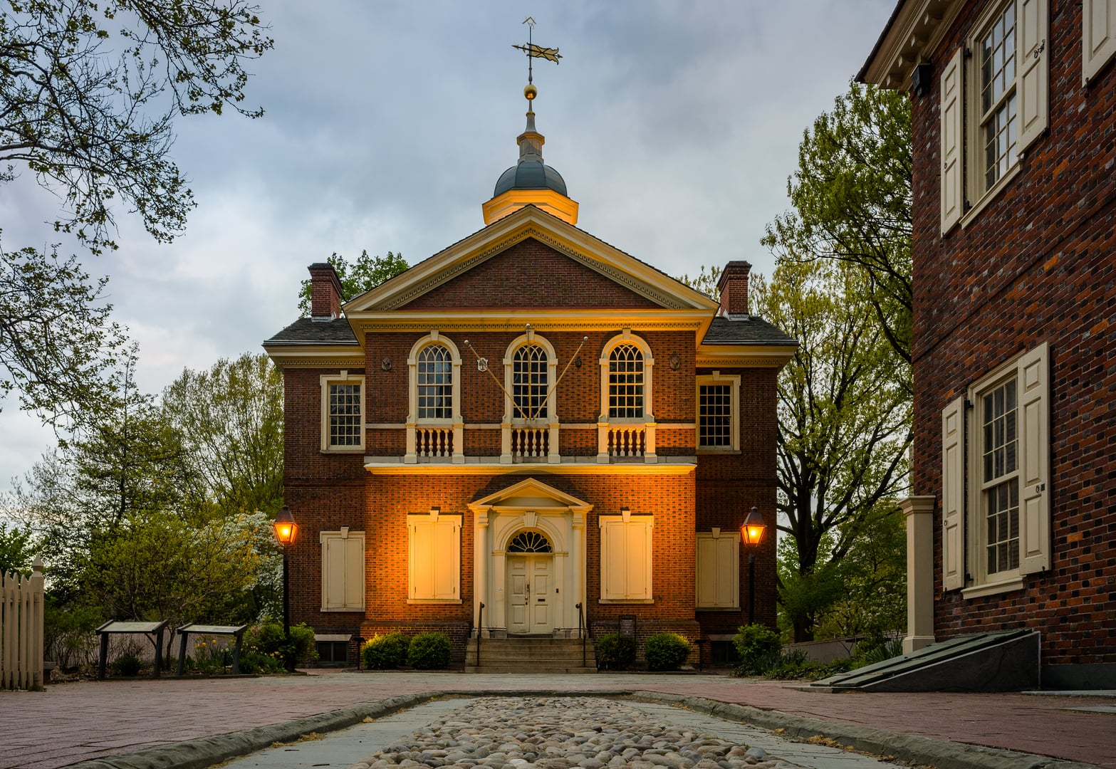Two-story Georgian brick Carpenters' Hall with cupola in Old City Philadelphia courtyard