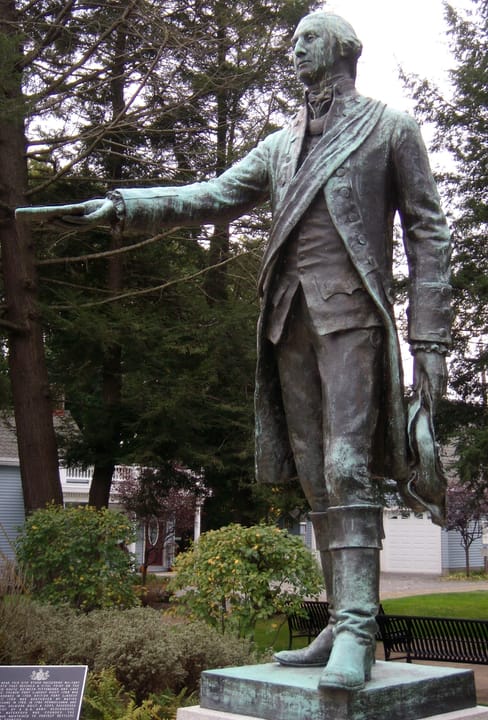 Photograph of a statue of George Washington in British uniform, a statue which stands in Waterford, Pennsylvania at the site of the old Fort Le Boeuf. The statue commemorates Washington's presentation of a message to the French at this site in 1753 demanding that the French leave the Ohio country.