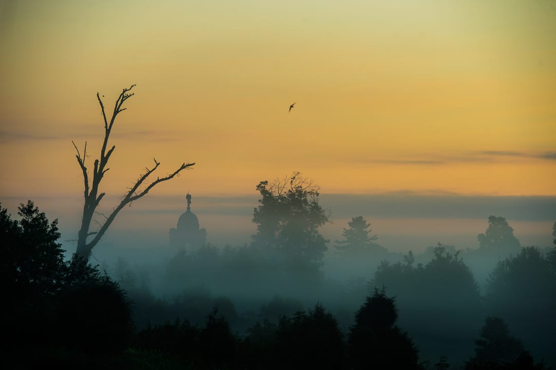 A 3-inch Ordnance rifle cannon silhouetted against the sky overlooking the Gettysburg battlefield in Pennsylvania