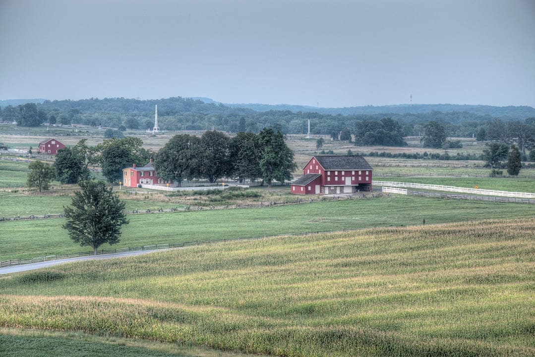 The Trostle farm and battlefield monuments seen from Longstreet Tower inside Gettysburg National Military Park.