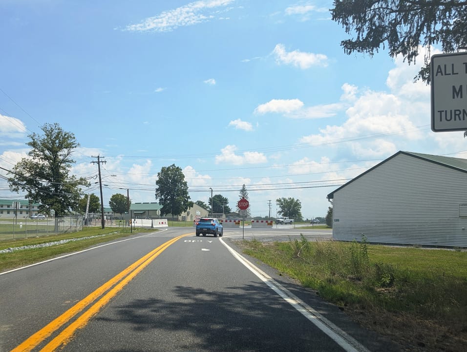 Photo of westbound Pennsylvania Route 443 (Moonshine Road) in East Hanover Township, Lebanon County, Pennsylvania inside Fort Indiantown Gap. The fort was previously an open campus however changes circa 2024date QS:P,+2024-00-00T00:00:00Z/9,P1480,Q5727902 closed off most entrances to the public forc