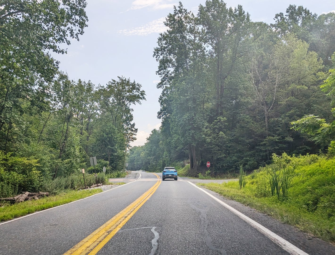 Photo of westbound Pennsylvania Route 443 (Moonshine Road) in East Hanover Township, Lebanon County, Pennsylvania inside Fort Indiantown Gap. The fort was previously an open campus however changes circa 2024date QS:P,+2024-00-00T00:00:00Z/9,P1480,Q5727902 closed off most entrances to the public forc